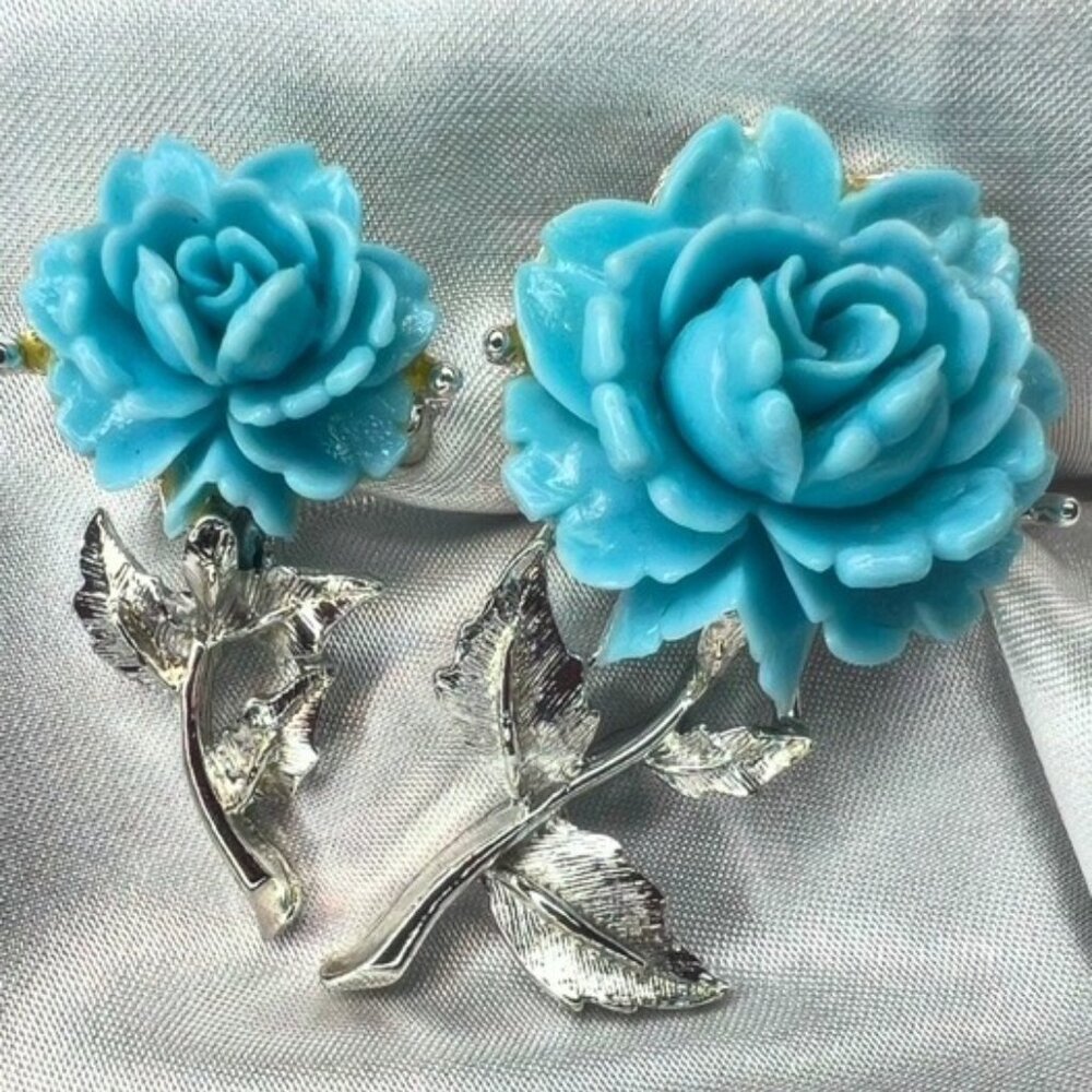 A Set of Vintage Sterling Silver Blue Rose Brooches